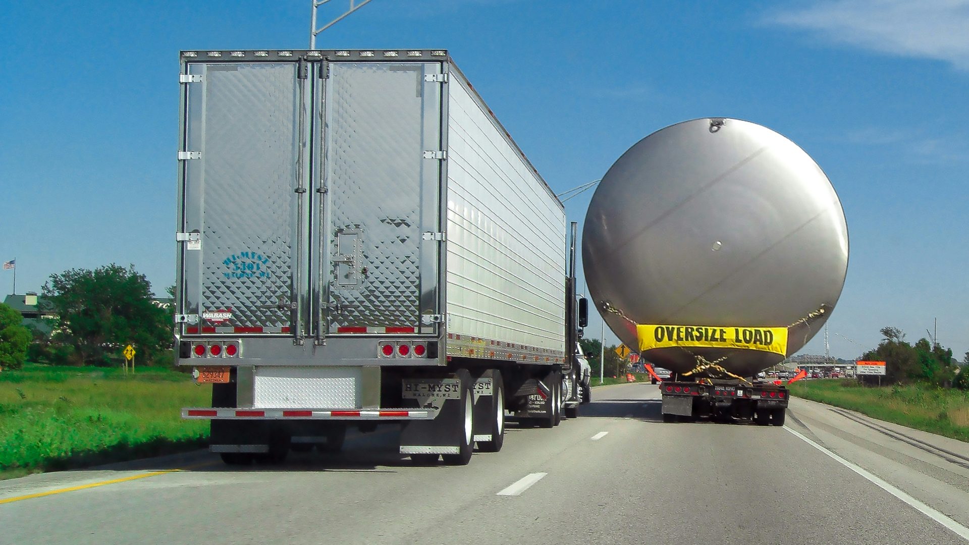 Large spherical tank transported on multi-axle trailers